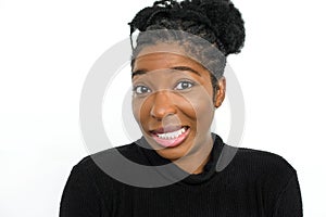 Uneasy African American woman in studio photo