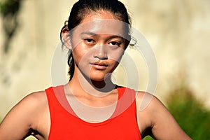 An Unemotional Young Filipina Teen Girl