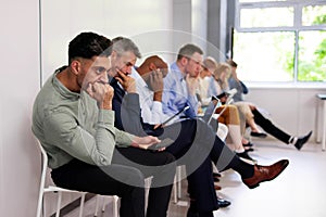 Unemployed Job Seekers. Bored People Waiting photo