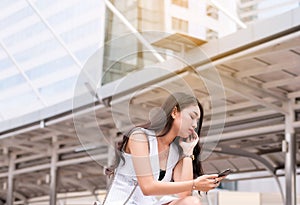 Unemployment problem concept,Asian beautiful woman stressed and depression from work while sitting outdoor