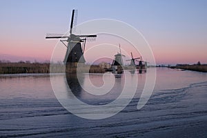 UNESCO World Heritage windmills stand in Kinderdijk, near Rotterdam Netherlands