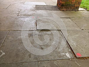 Uneven paving slabs in shopping centre causing trip hazard