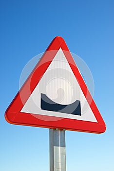 Uneven road sign