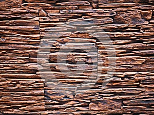 Uneven stone facade close-up. Torn stone texture. Stone wall. Stonewall abstract background