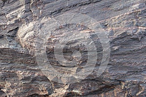 Uneven surface of natural unwrought stone