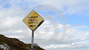 Uneven Surface Sign on the Rocky Mountain Walking Track by the Sea Coast in Ben of Howth, Ireland