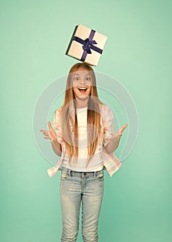 Unexpected bonus. Birthday wish list. Happiness and joy. Happy birthday concept. Pleasant surprise. Girl kid hold photo