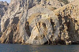 Unexpected formation are seen in the rocks of an ancient volcano Kara-Dag.