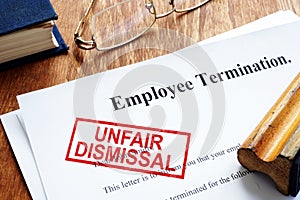 Unfair dismissal stamp on the Employee Termination photo