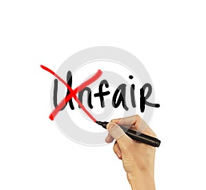 Unfair - male hand writing text on white background photo