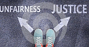 Unfairness and justice as different choices in life - pictured as words Unfairness, justice on a road to symbolize making decision