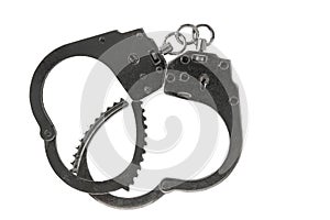 Unfastened silver handcuffs, isolated on a white background
