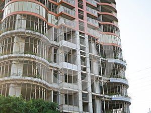 Unfinished abandoned residential high rise apartment building construction project downtown suburbs Hanoi, Vietnam, reinforced