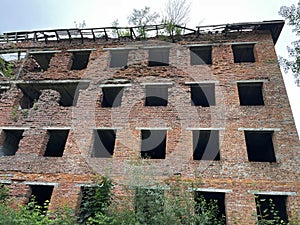 Unfinished bricks building. Abandoned house