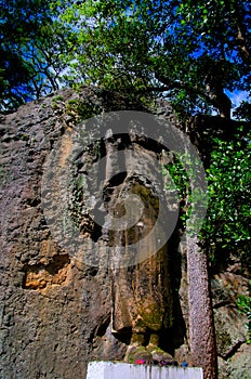 The unfinished Buddha image at Dhowa Raja Maha Vihara rock temple, Bandarawela, Sri Lanka