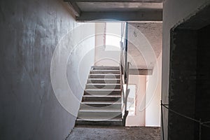 Unfinished building interior, detail of a white room. empty home renovation before concept