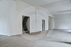 Unfinished building interior, white room.Repairs in the apartment.