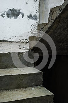 Unfinished cement stairs, perspective of crossed concrete stairs