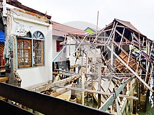An unfinished demolish floating house