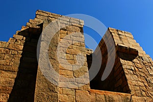 The unfinished facade wall with sky of the ancient Brihadisvara Temple in Gangaikonda Cholapuram, india.