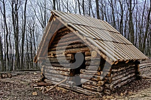 Unfinished historical medieval wooden clapboard cabin in Bojna, Slovakia