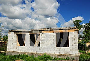 Unfinished house with autoclaved aerated concrete blocks, white blocks wall.