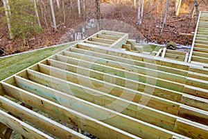 Unfinished installation deck patio construction of flooring by house