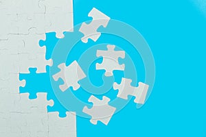 A unfinished puzzle with pieces