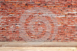Unfinished red brick wall of house under construction