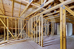Unfinished roofing of interior view of a house residential construction framing against
