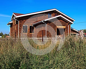 Unfinished wood cottage.