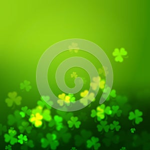 Unfocused shamrock leaves, Saint Patricks Day vector background photo