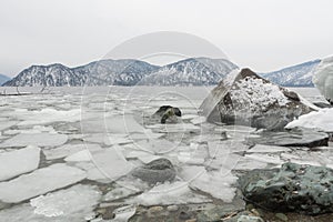 unfrozen Lake Teletskoye in winter. Russia Altai Krai