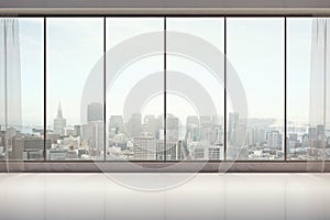 Unfurnished interior with city view