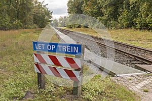 Unguarded railroad crossing photo