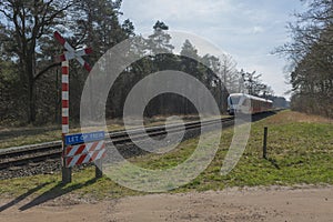 Unguarded railroad crossing photo