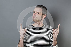 Unhappy 40s man giving a strong warning with hands