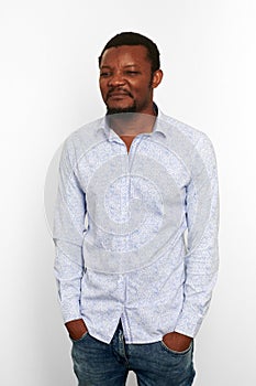 Unhappy african american black man in casual bright shirt with small beard isolated white background