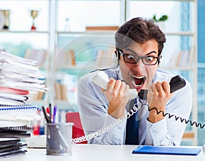 Unhappy angry call center worker frustrated with workload