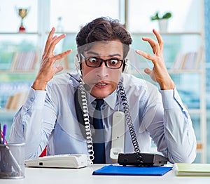 Unhappy angry call center worker frustrated with workload