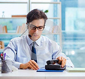 Unhappy angry call center worker frustrated with workload