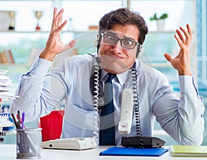 Unhappy angry call center worker frustrated with workload