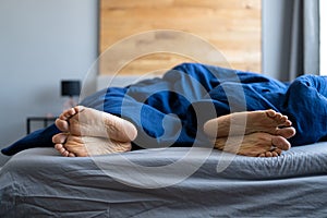 Unhappy Angry Divorce Feet In Bedroom photo