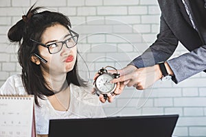 Unhappy Asian worker bored with annoying boss photo