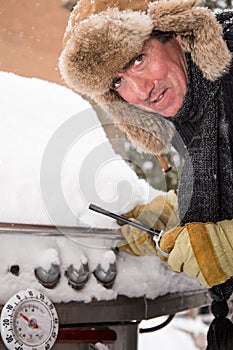 Unhappy Barbeque guy in Snow