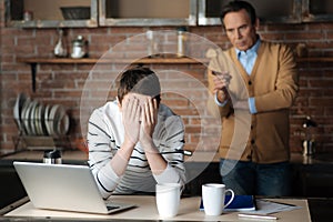 Unhappy boy having some problems in his family