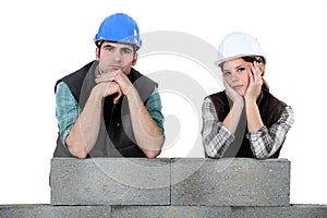 Unhappy bricklayers photo