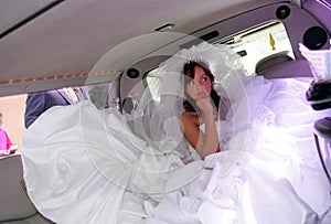 Unhappy bride in Limousine