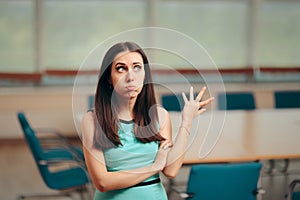 Unhappy Business Woman Waiting in Empty Conference Room