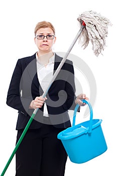 Unhappy businesswoman cleaning